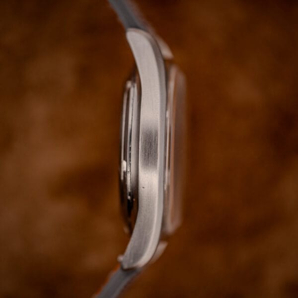 Eterna KonTiki 20 cushion case side profile showing brushed steel flank and lug shape