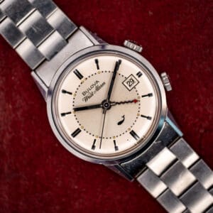 Bulova Sea King Wrist Alarm ref. 773 silver dial with date, whale emblem and twin crowns on a steel bracelet