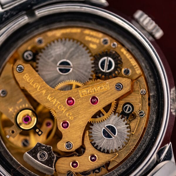 Bulova caliber 11ATRCD stamped on the gilt bridge beside BULOVA WATCH Co in the Sea King Wrist Alarm