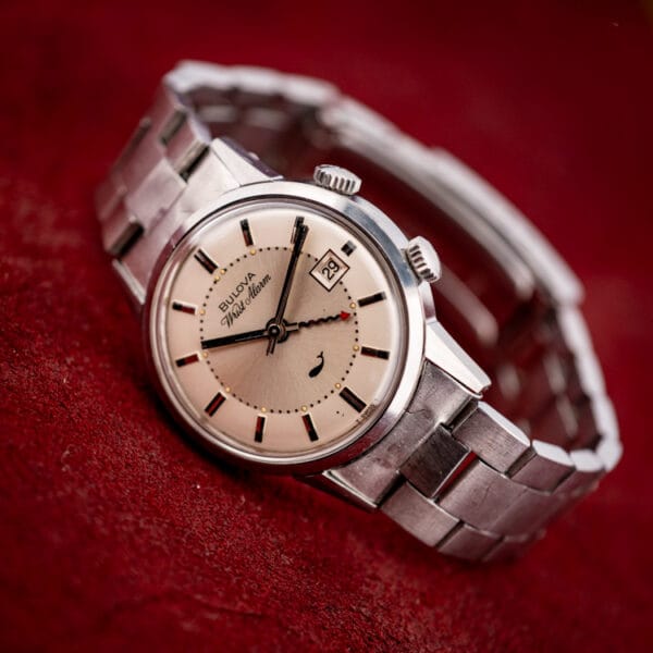 Bulova Wrist Alarm ref. 773 in warm light with the twin alarm and time crowns on the right flank