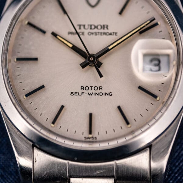 Tudor 74000N silver dial reading ROTOR SELF-WINDING with baton hands and SWISS at six