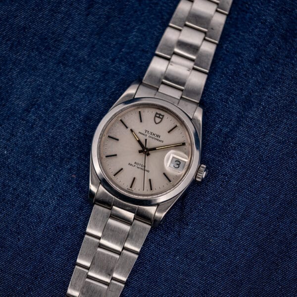 Tudor Prince Oysterdate 74000N three-quarter view, silver dial and folded-link steel bracelet