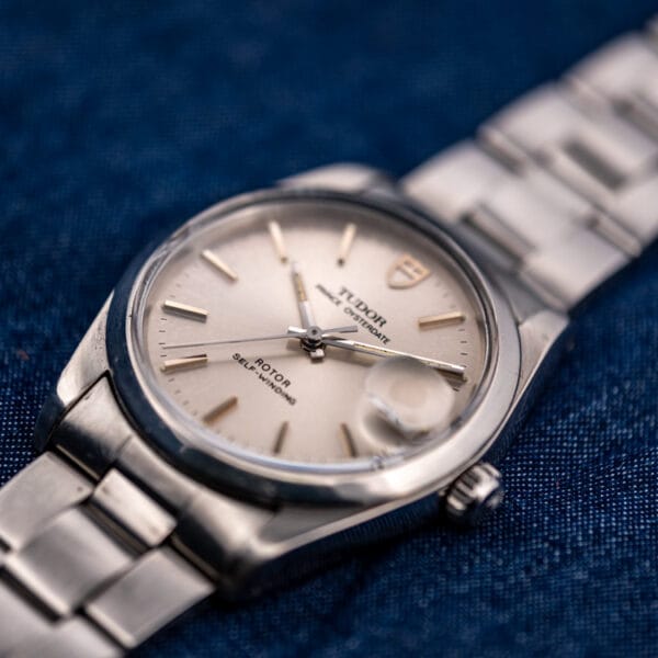 Tudor Prince Oysterdate 74000N angled under its domed acrylic crystal showing the steel case