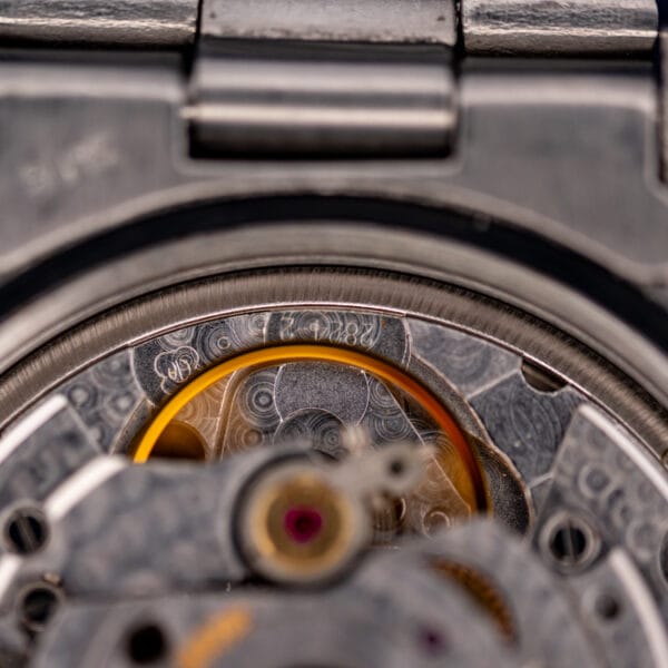 Tudor 74000N movement macro showing the ETA 2824-2 caliber engraving and perlage finishing