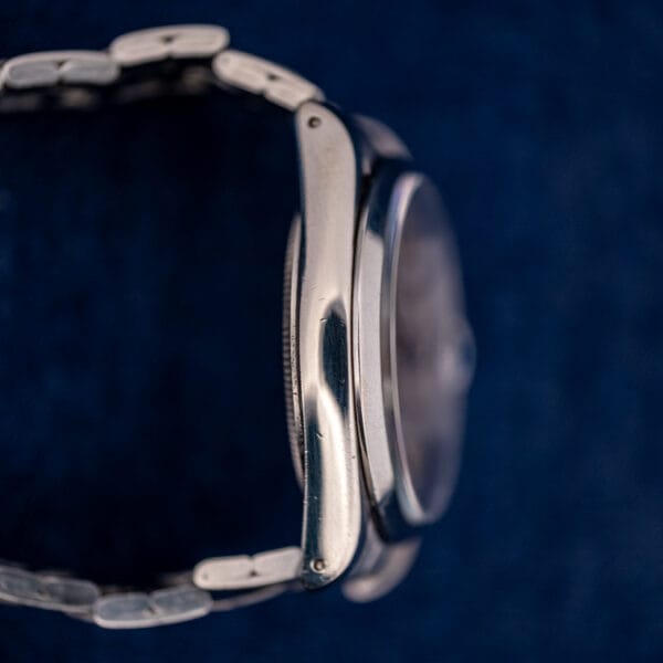 Tudor Prince Oysterdate steel case side profile with domed acrylic crystal and screw-down back