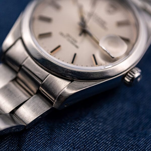 Tudor Prince Oysterdate 74000N three-quarter macro, coronet crown and honest wear on the lugs