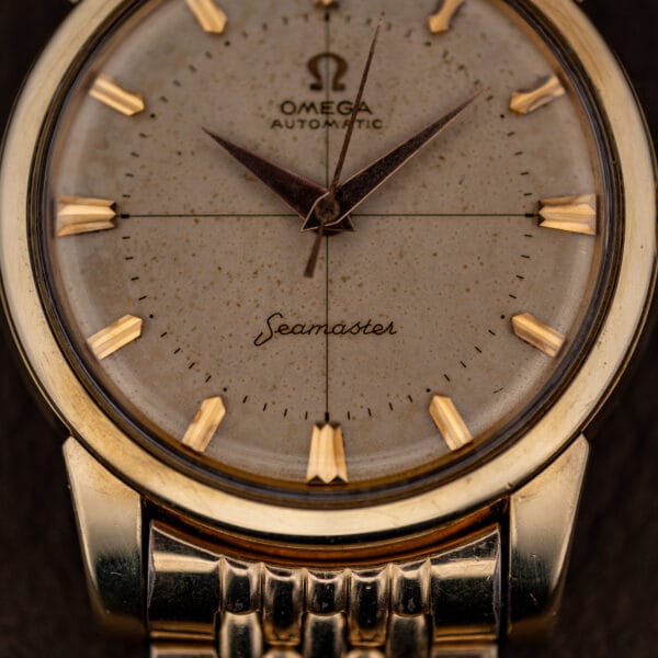 Omega Seamaster 2848 cream dial close-up with crosshair and Seamaster script above six o'clock