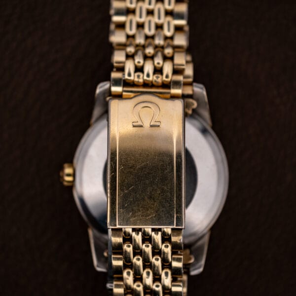 Omega Seamaster 2848 beads-of-rice bracelet folding clasp embossed with the Omega symbol
