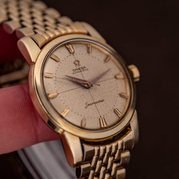 Omega Seamaster 2848 dial detail with applied Omega logo, Seamaster script and even freckled patina