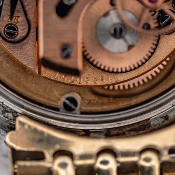 Omega Seamaster 2848 caliber 501 automatic movement with its stamped serial number and copper-rose finish