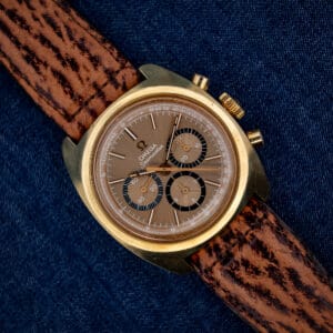 Omega Seamaster 145.029 gold-plated chronograph with warm mocha sunburst dial on brown sharkskin strap, top view
