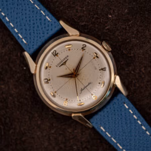 Vintage Longines 2269-1 automatic top down on blue leather strap, crosshair dial with applied gold numerals and faceted markers