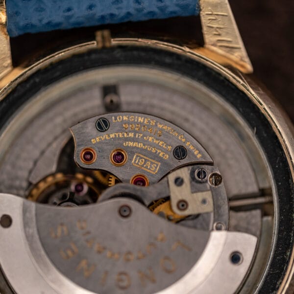 Longines 19AS macro stamped SEVENTEEN 17 JEWELS and UNADJUSTED with serial 9920415 beside three ruby jewels
