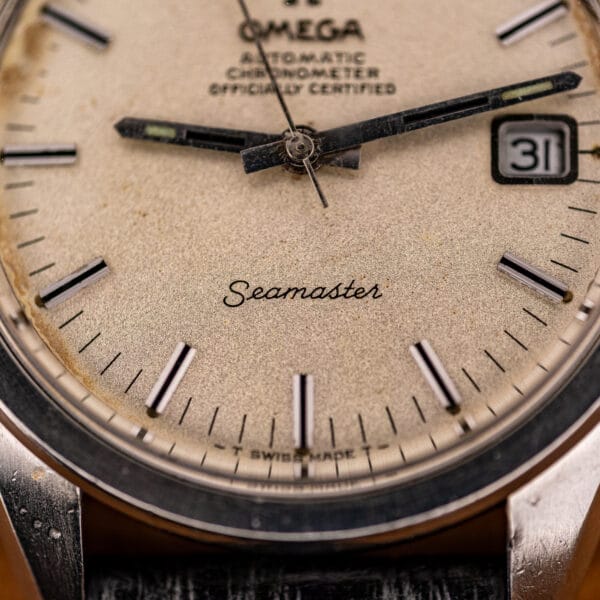 Lower dial macro of the Omega Seamaster 168.022 with the Seamaster script and T Swiss Made T signature above the minute track.