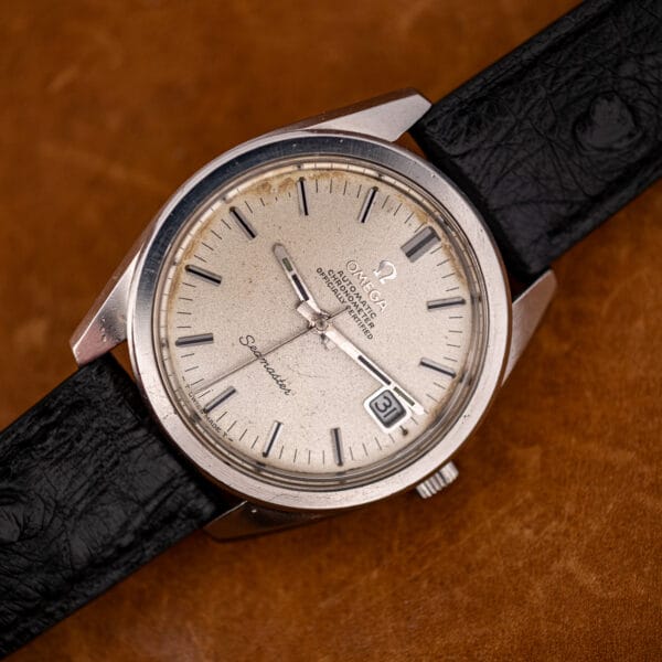 Straight-on view of the Omega Seamaster 168.022 chronometer dial with the date reading 31 and warm toning around the perimeter.