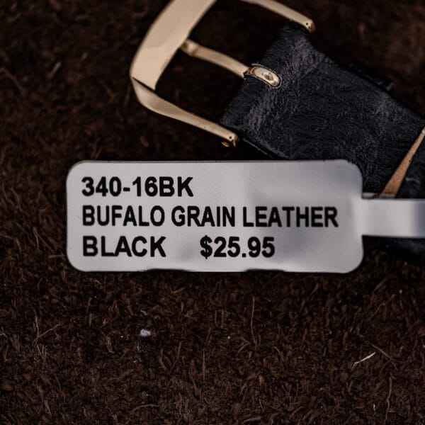 Hamilton Wilshire black buffalo-grain leather strap tag reading 340-16BK beside the plain gold-tone buckle