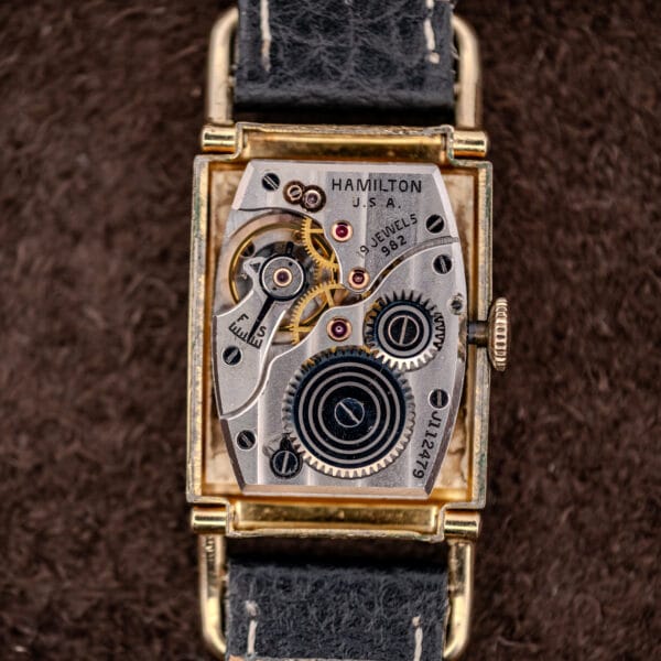 Hamilton caliber 982 movement stamped HAMILTON U.S.A. 19 JEWELS 982 with the fast-slow regulator index