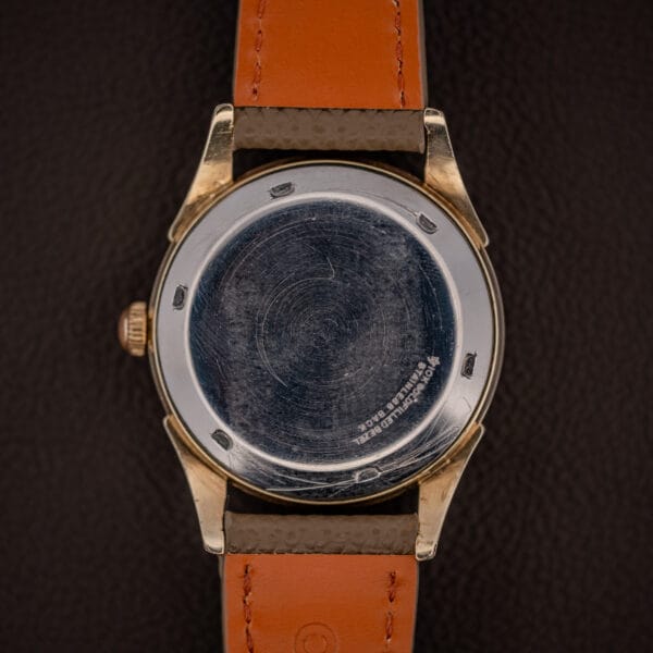 Tissot stainless steel snap caseback stamped 10K GOLD FILLED BEZEL STAINLESS BACK with a star mark