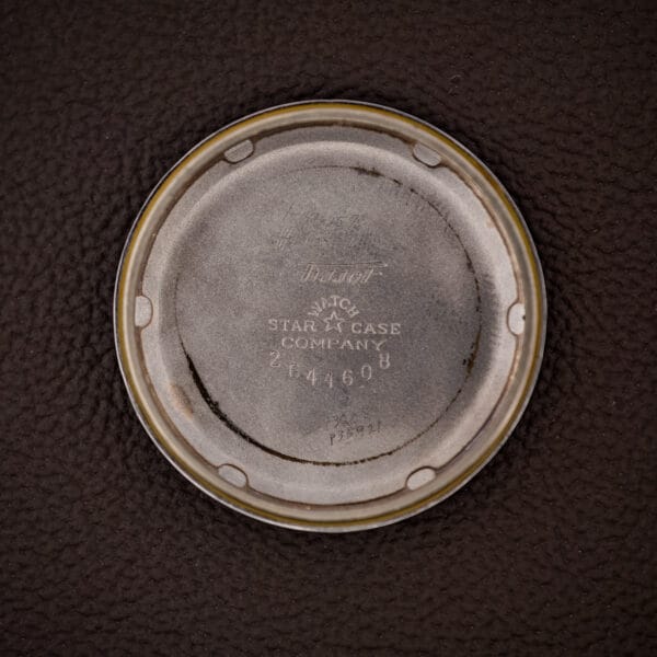 Tissot inner caseback engraved with cursive Tissot and STAR WATCH CASE COMPANY, an American gold-filled case