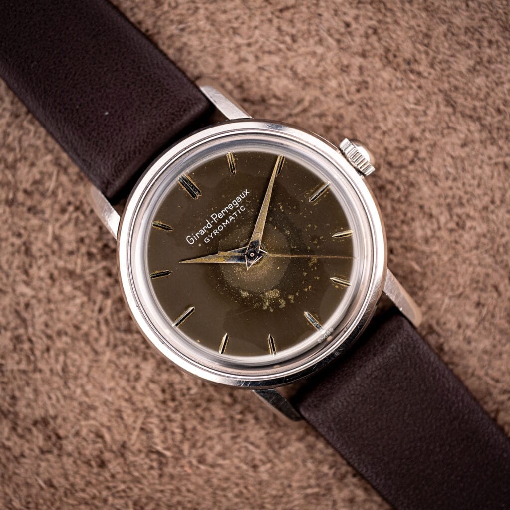 Girard-Perregaux Gyromatic vintage watch, brown dial signed GYROMATIC with dauphine hands, on brown leather strap