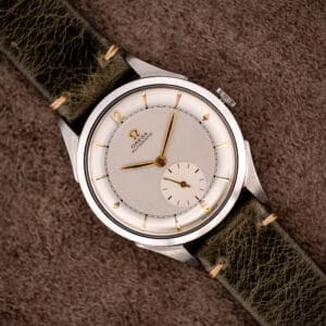 Omega Automatic bumper ref. 2421/4 two-tone silvered dial with gold Arabic 12 and 6, sub-seconds at six