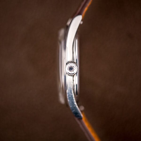 Omega Seamaster 2937-5 signed Omega crown and polished stainless steel case flank in side profile