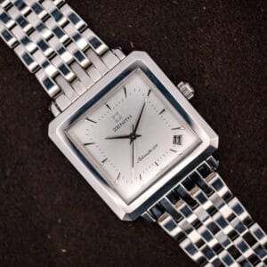 Zenith Elite 670 square steel dress watch with silver sunburst dial, front view