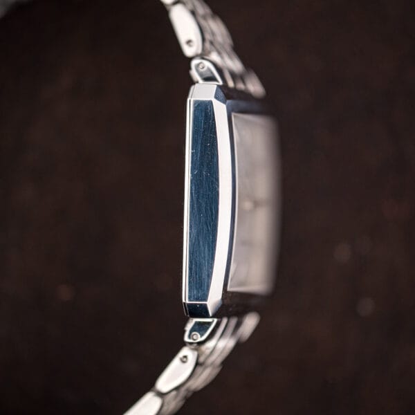 Zenith Elite square case flank showing light hairlines from wear