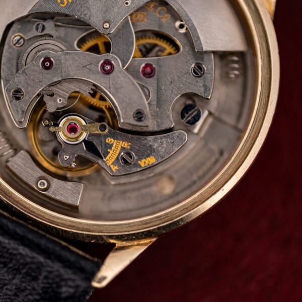 LeCoultre 476/3 balance and regulator, ruby jewels in gold chatons and the orange VXN Vacheron import stamp