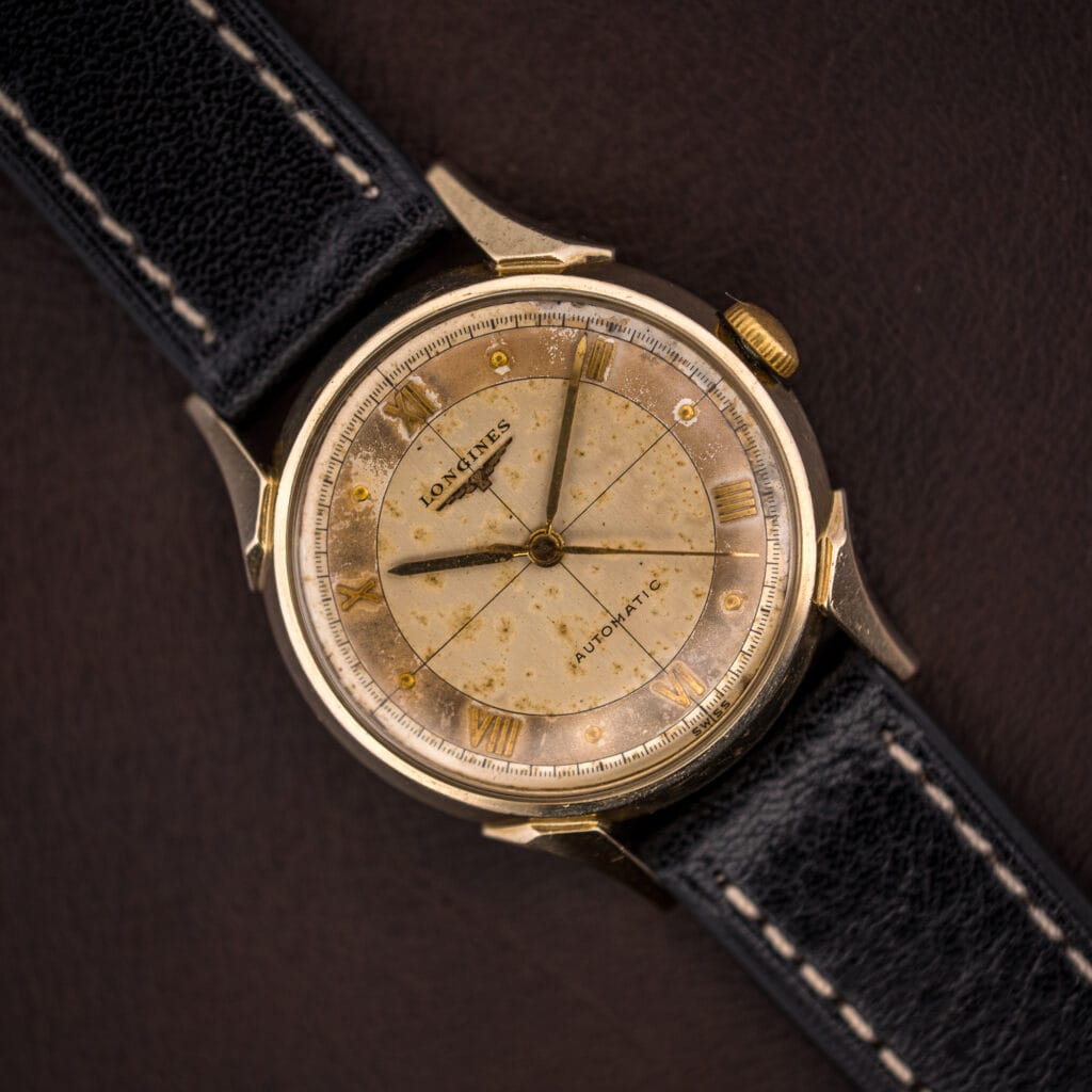 Vintage Longines Automatic Ref. 2030 gold-filled dress watch with a warm tropical cross-hair dial on a black leather strap