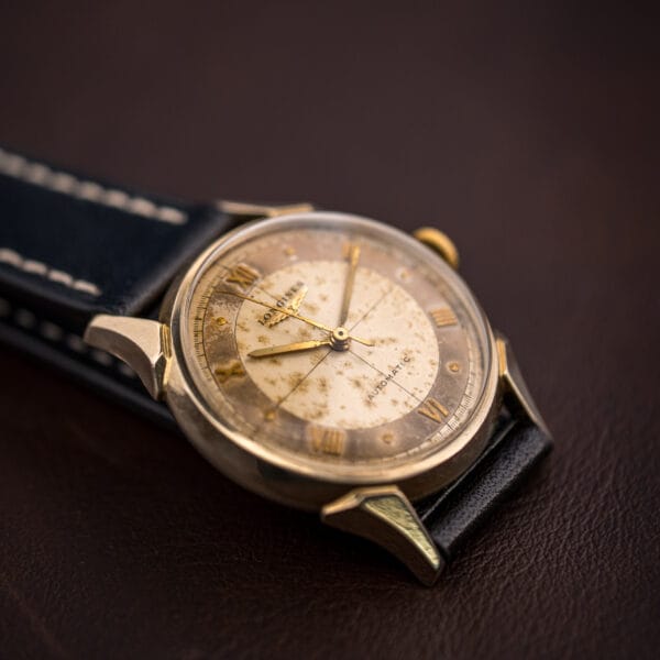Longines 2030 gold-filled caseback with a 25 Year Club presentation engraving dated 1954 above the 10K GOLD FILLED stamp