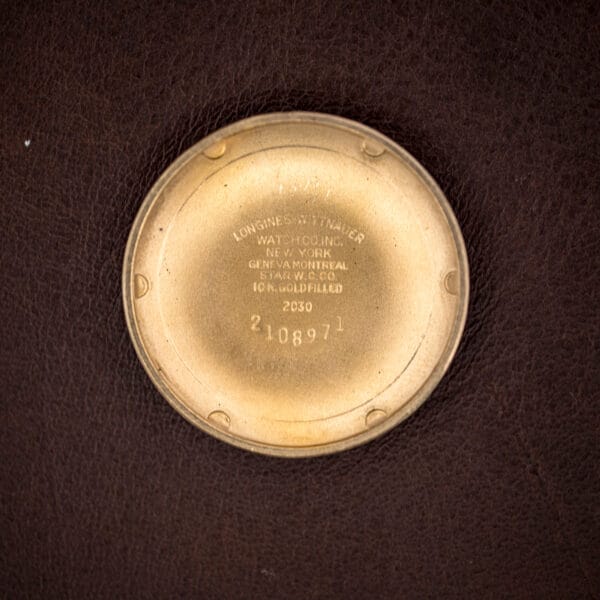 Longines 2030 inner caseback stamped LONGINES-WITTNAUER NEW YORK, STAR W.C. CO. and 10K. GOLD FILLED