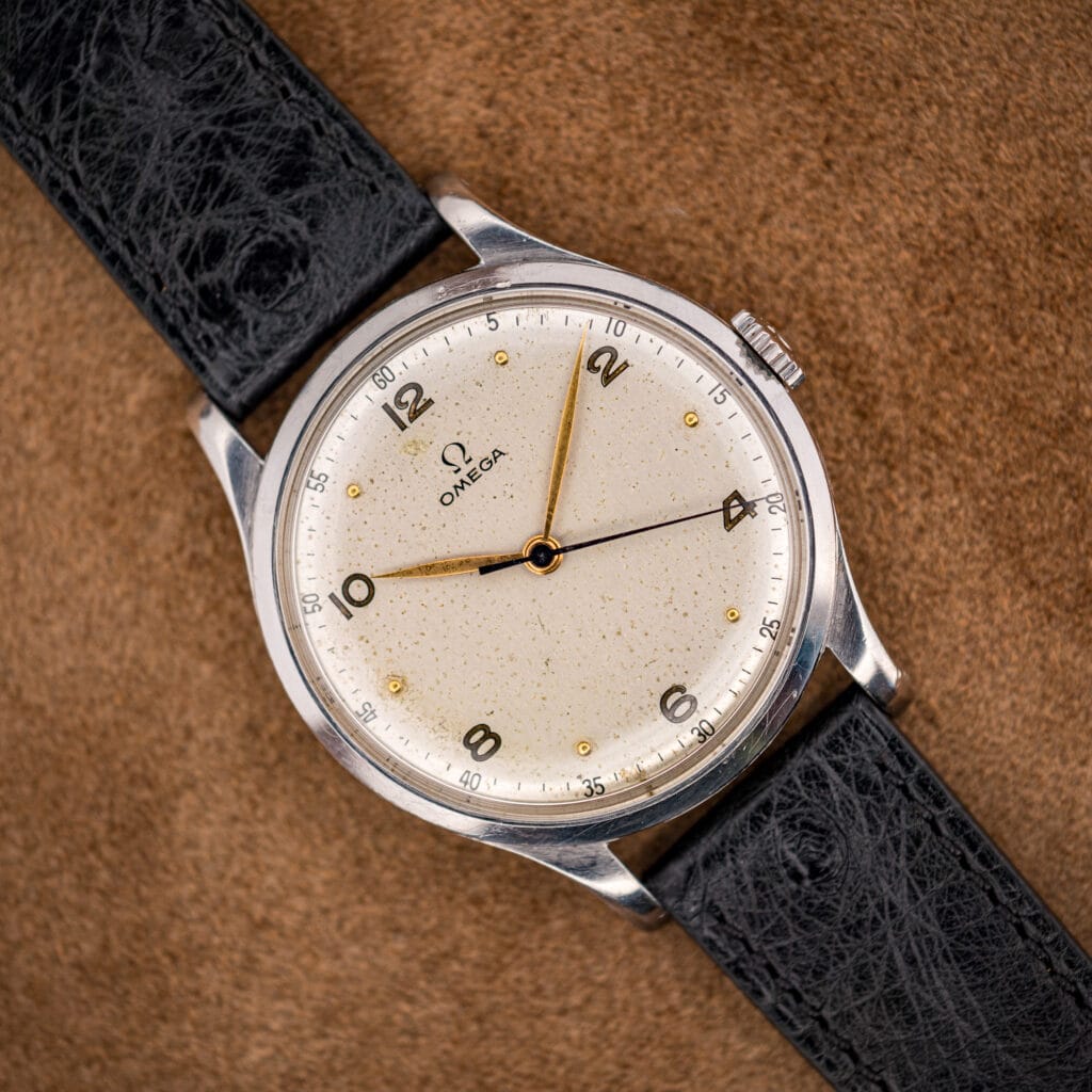 Omega Jumbo ref. 2256/1 oversized stainless steel dress watch, warm cream dial and gilt leaf hands on black ostrich
