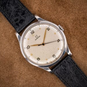 Omega Jumbo ref. 2256/1 oversized stainless steel dress watch, warm cream dial and gilt leaf hands on black ostrich