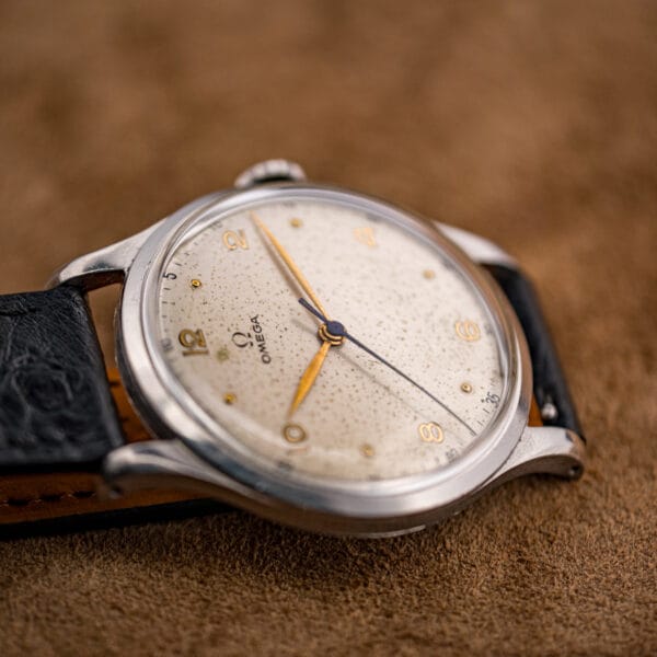 Domed polished outer caseback of the Omega Jumbo 2256/1 with initials scratched into it by a former owner