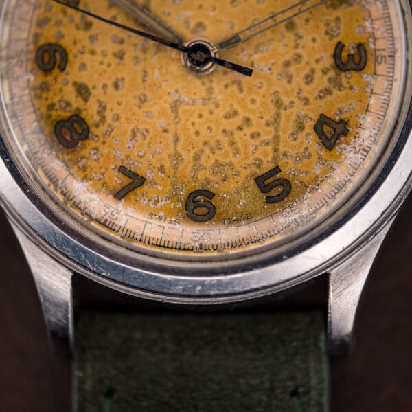 Aged Omega tropical dial with SWISS MADE printed at six o'clock