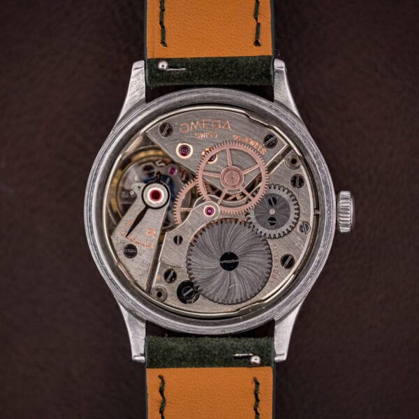 Omega caliber 30T2 SC manual-wind movement with 16 jewels and copper-gilt wheels