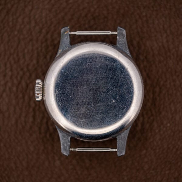 Longines vintage military-style watch, bare unmarked snap caseback with removable spring bars
