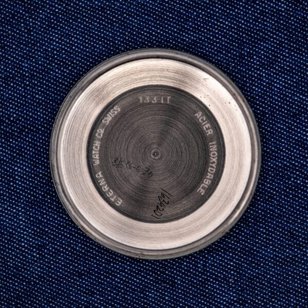 Inner caseback stamped ETERNA WATCH Co SWISS and ACIER INOXYDABLE with the 133 IT reference.
