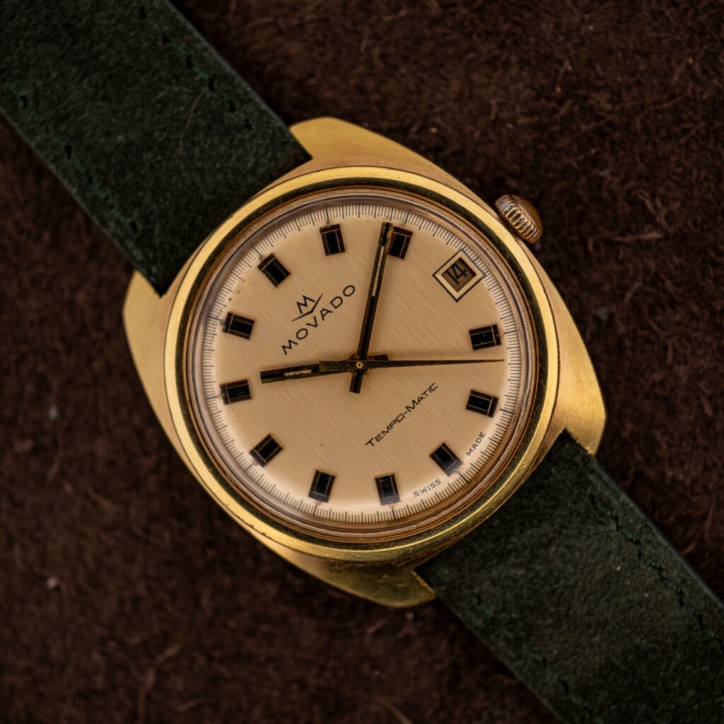 Movado Tempomatic Sub-Sea 138-625-502 champagne linen dial with gold framed baton markers and date at three