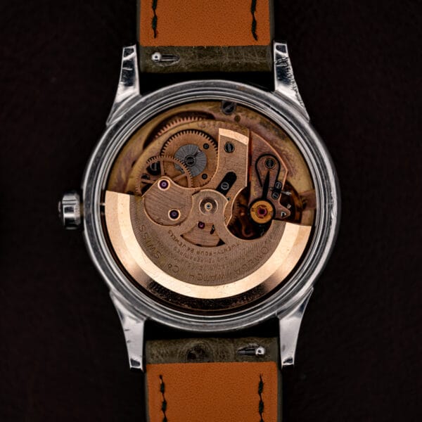 Omega caliber 504 automatic under its copper-toned rotor signed OMEGA WATCH Co SWISS, twenty-four jewels
