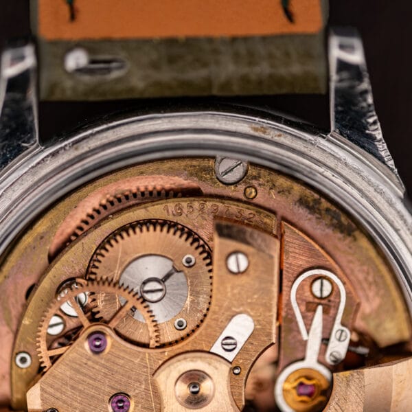 Movement serial 16529732 stamped on the Omega 504 mainplate, ratchet wheel and regulator alongside
