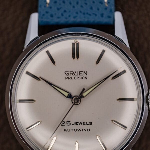 Macro of the Gruen Precision dial showing applied faceted markers and the double baton index at twelve.