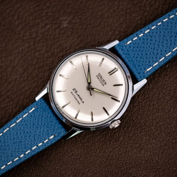 Three-quarter view of the Gruen Precision Autowind highlighting the polished case and signed crown at three.