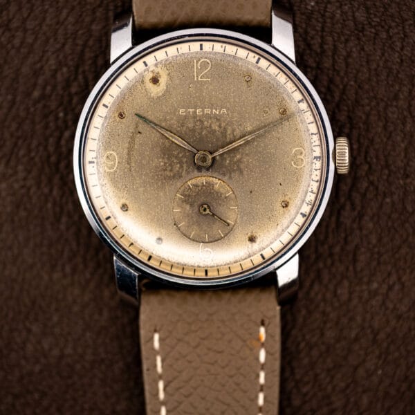 Vintage Eterna Cal. 965 taupe dial with cream chapter ring, aged luminous plots and snailed sub-seconds register