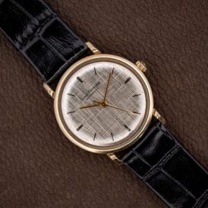 Girard Perregaux Gyromatic silver linen dial with applied gold baton markers and gold hands on black leather strap