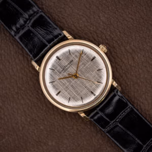 Girard Perregaux Gyromatic silver linen dial with applied gold baton markers and gold hands on black leather strap