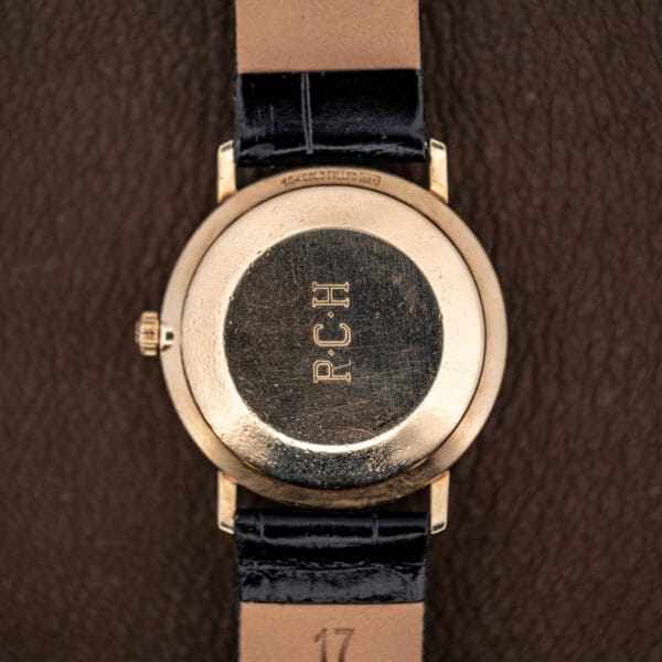 Girard Perregaux Gyromatic caseback engraved with an R.C.H. monogram above the 10K GOLD FILLED case stamping
