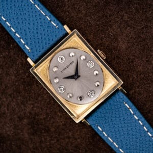 Longines Tank 3217-428 in 10k gold filled case with silver dial, diamond hour markers and blue leather strap
