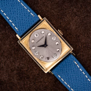 Longines Tank 3217-428 in 10k gold filled case with silver dial, diamond hour markers and blue leather strap